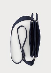 Navy blue crossbody bag with double zippered compartments, adjustable strap, and textured fabric. Smooth interior lining visible.