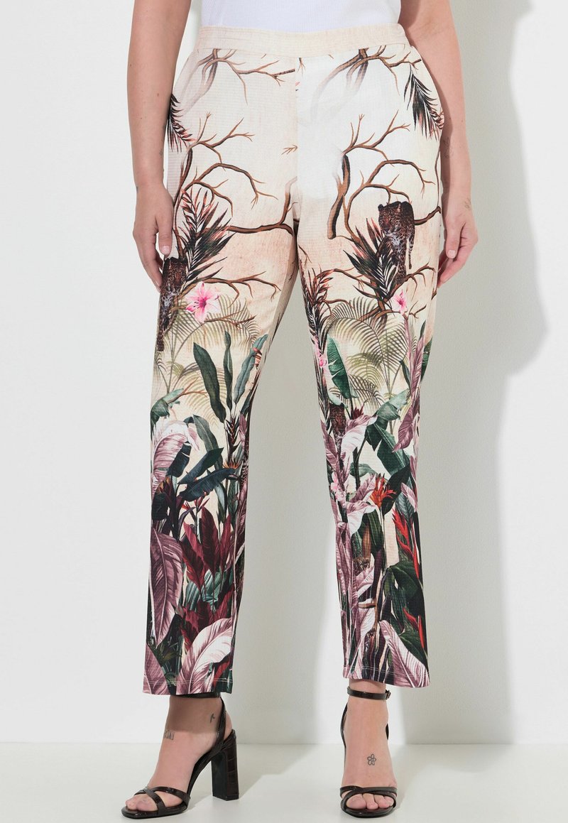 Pantaloni in un tessuto beige chiaro con un motivo floreale tropicale colorato. Design a gamba dritta con una texture morbida.