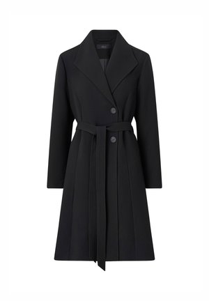 Zwarte damesjas tot op de knie met brede revers, twee knopen, lange mouwen en een tailleceintuur die aan de voorkant is gestrikt.