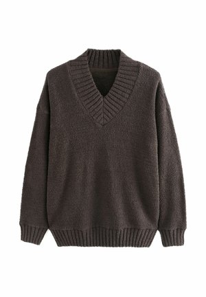 Sötétbarna, oversized pulóver puha, texturált anyagból, V-nyakkal és bordás mandzsettával, valamint aljjal. Lazább fazonnal rendelkezik.