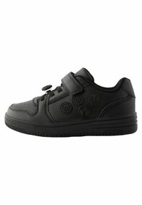 Mustad mustad/sneaker, sile meekse sünteetilise ülemisega, ümar nina, kleeplindi rihm ja ümmargused tekstuuriga mustrid külgedel. Kummi talla.