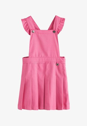 Rosa plissiertes Latzkleid mit gerafften Schulterriemen und kleinem herzförmigem Anhänger am Taillenband.