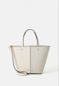 Beige totebag met gestructureerd leer en een bedrukt monogramdetail. Voorzien van twee bovenhandgrepen en een afneembare schouderriem.