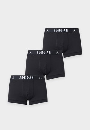 Trois paires de boxers Jordan noirs avec ceintures marquées affichant le logo Jumpman et le texte "JORDAN" en blanc.