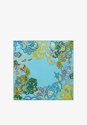 Blue background fabric with small white polka dots and ornate floral paisley patterns in green, yellow, beige, and blue around edges.