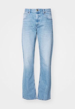 Light blue denim flared jeans with a high waistband, front pockets, and a zip-fly closure. Features subtle fading and stitching details.