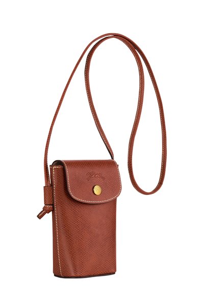 Brown leather crossbody bag with a textured finish, a flap closure, and a gold snap button. Includes a long adjustable shoulder strap.