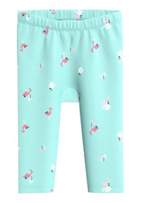 Helle blaue Leggings mit einem elastischen Bund, die ein wiederholtes Muster von rosa Flamingos und weißen Blumen zeigen. Hergestellt aus weichem, dehnbarem Stoff.