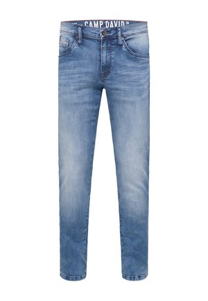 Light blue denim jeans feature a straight-leg design with a slightly faded texture, five pockets, and a branded waistband.