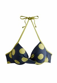 Blå och grön baddräktsöverdel med prickar, triangulära kupor, en snoddat framsidesdesign och justerbara halterneckband.