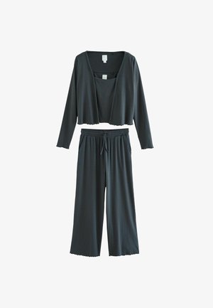 Mørkegrå loungewear sæt med en cropped langærmet top med bølgede kanter og løstsiddende, brede bukser med elastisk taljebånd.