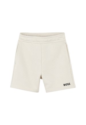 Shorts in cotone crema con vita elastica, dotati di due tasche laterali e di un logo "BOSS" nero sul lato sinistro inferiore.