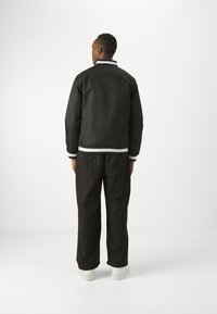 New Era NBA LOS ANGELES LAKERS LOGO SELECT JACKET - Vereinsmannschaften - black