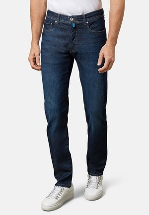Vaqueros tapered - used denim