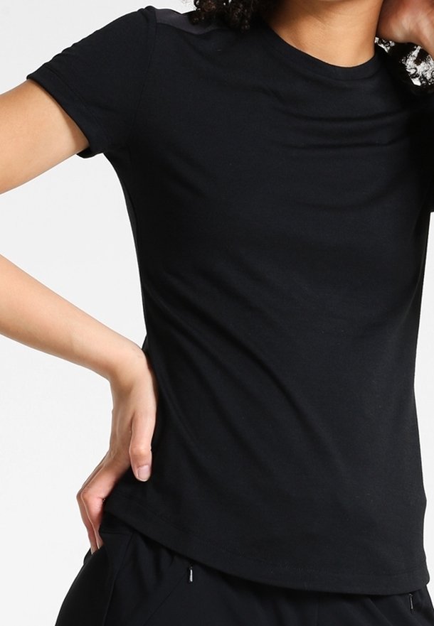 Black short-sleeve t-shirt made of cotton, featuring a crew neckline and a fitted design. Smooth texture with no visible patterns or accents.