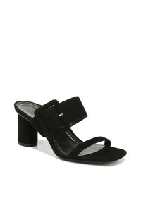 Zwarte suede hoge hakken met een brede band met een vierkante gesp en een slanke enkelband. Blokhak en gevoerde inlegzool.