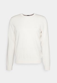 Hellbeige Pullover mit Rundhalsausschnitt aus weichem Material, ausgestattet mit langen Ärmeln, gerippten Bündchen und einem dezenten Logo auf der Brust.