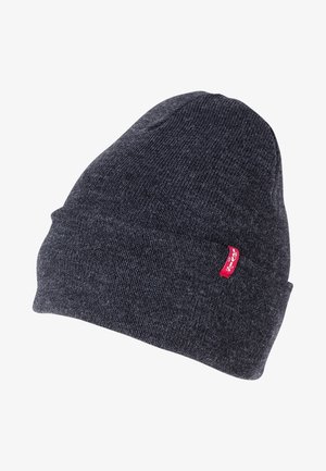 Bonnet en tricot gris foncé avec revers retourné et petite étiquette rouge avec le logo Levi's sur le côté.