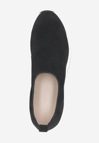 Black suede slip-on shoe with a rounded toe, elastic side panels, and a textured white rubber sole. Leather interior with subtle branding.