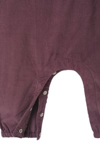 Burgundy corduroy baby romper with a ribbed texture, snap-button closure on the side, and elastic cuffs at the leg openings.