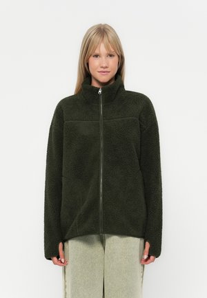 Dark green fleece jacket with a high collar and full zipper, featuring a textured surface and a relaxed fit.