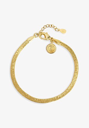 Gularmbånd med en tekstureret finish, der har en lås og en charm med et dekorativt logo. Justerbar kæde til størrelse.