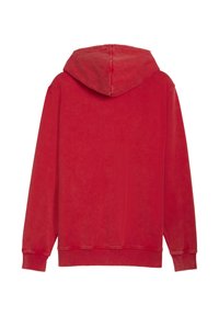 Rød hættetrøje med en struktureret overflade, der har en stor hætte, ribbede manchetter og pels. Stoffet ser blødt og afslappet ud, hvilket gør det velegnet til hverdagsbrug.