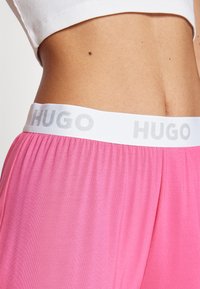 HUGO UNITE - Donji dio pidžame - bright pink