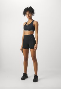 Nike Performance UNIVERSA SHORT - Leggings - black