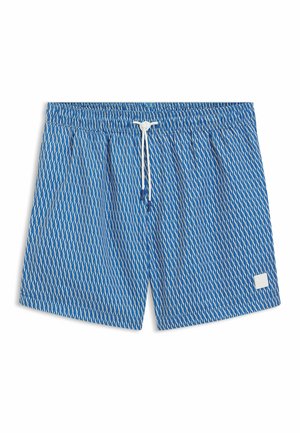Blue swim trunks with a geometric white pattern, elastic waistband, and adjustable drawstring. White label at the bottom right.