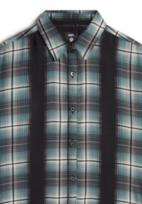 Chemise à carreaux noire et canard avec un devant à boutons, un col et de légères lignes blanches. Fabriquée dans un tissu lisse avec un design structuré.