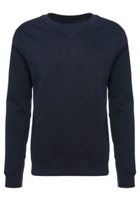Sweat-shirt bleu marine à col rond, manches longues, poignets et base côtelés, avec un logo discret sur la poitrine côté gauche.