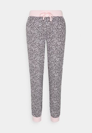 Pantaloni jogger leggeri con una fantasia a pois neri su fondo bianco, con una morbida vita e polsini rosa chiaro, dotati di un cordoncino regolabile.