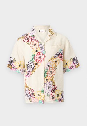Chemise beige à manches courtes avec des motifs floraux brodés multicolores sur le devant, les manches et le col, boutonnée au centre.