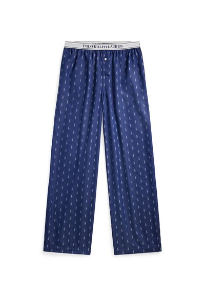 Mörkblå pyjamasbyxor med ett upprepande litet logomönster, tillverkade av mjukt tyg med resårmidja och knappstängning.