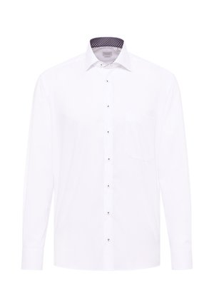 Chemise blanche à manches longues en coton, avec un col intérieur à motifs contrastés, une patte de boutonnage avec de petits boutons et une poche sur la poitrine.