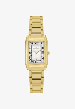 Obdĺžnikové hodinky so zlatým tónom, bielym ciferníkom, čiernymi rímskymi číslicami a zobrazením dátumu. Kovový náramok s lesklými, leštenými článkami.
