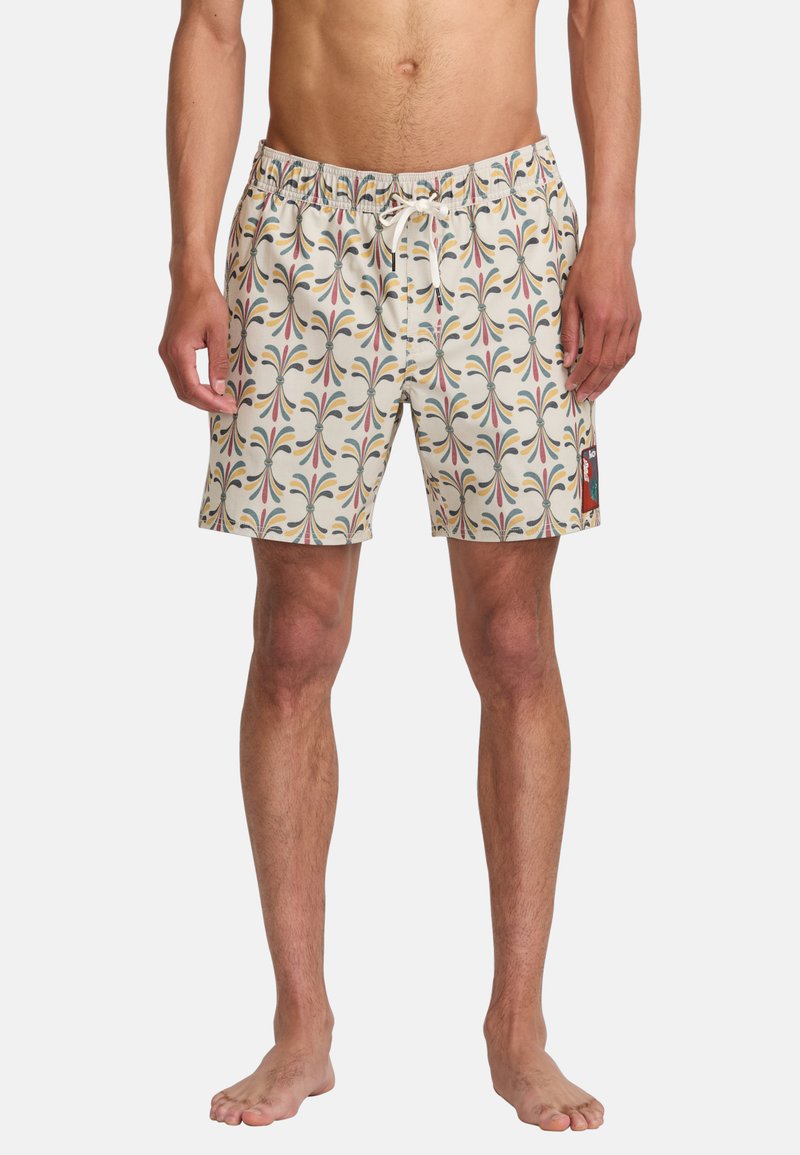 Men's swim trunks in a cream color with a multicolored abstract pattern. Features an elastic waistband and a small logo patch on the side.