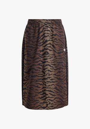 Jupe marron avec un motif à rayures tigre noires, taille élastique, bandes latérales et un petit logo blanc à l'avant.