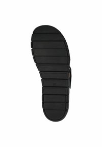 Talpa de pantof din cauciuc negru cu textură anti-alunecare, având nervuri orizontale și verticale, vârf rotunjit și marcaj de mărime "37" lângă călcâi.