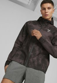 Puma Windbreaker - black aop/schwarz - Zalando.ch