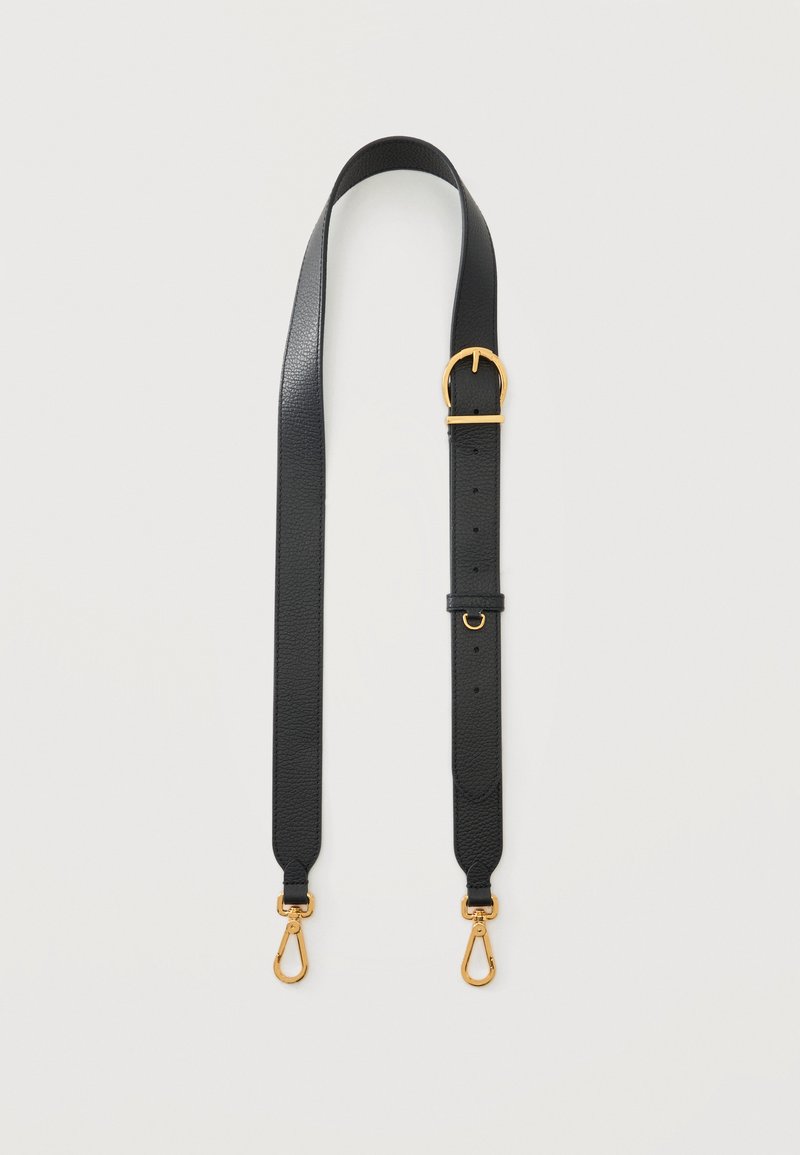 Bandoulière de sac en cuir noire ajustable avec boucle dorée et fermoirs pivotants dorés aux deux extrémités, présentée à plat sur fond blanc.