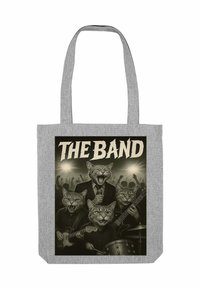 Grijze tote bag met een afbeelding van katten die op het podium instrumenten spelen, met de tekst "DE BAND" erboven. Glad materiaal, stevige handvatten.