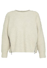 Pull en tricot texturé crème avec une forme carrée, un col rond et des fermetures éclair latérales. Tissu doux avec un motif gaufré. Manches longues.