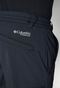 Columbia WANOGA™ PRO VENT PANT - Hlače za otvoreno - black