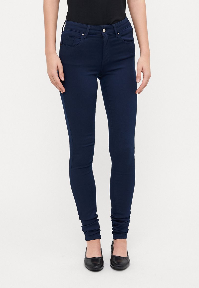 Mørkeblå skinny jeans med høy midje, to frontlommer og sølvfarget knappe-lukking. Glatt, elastisk stoff med tettsittende passform.