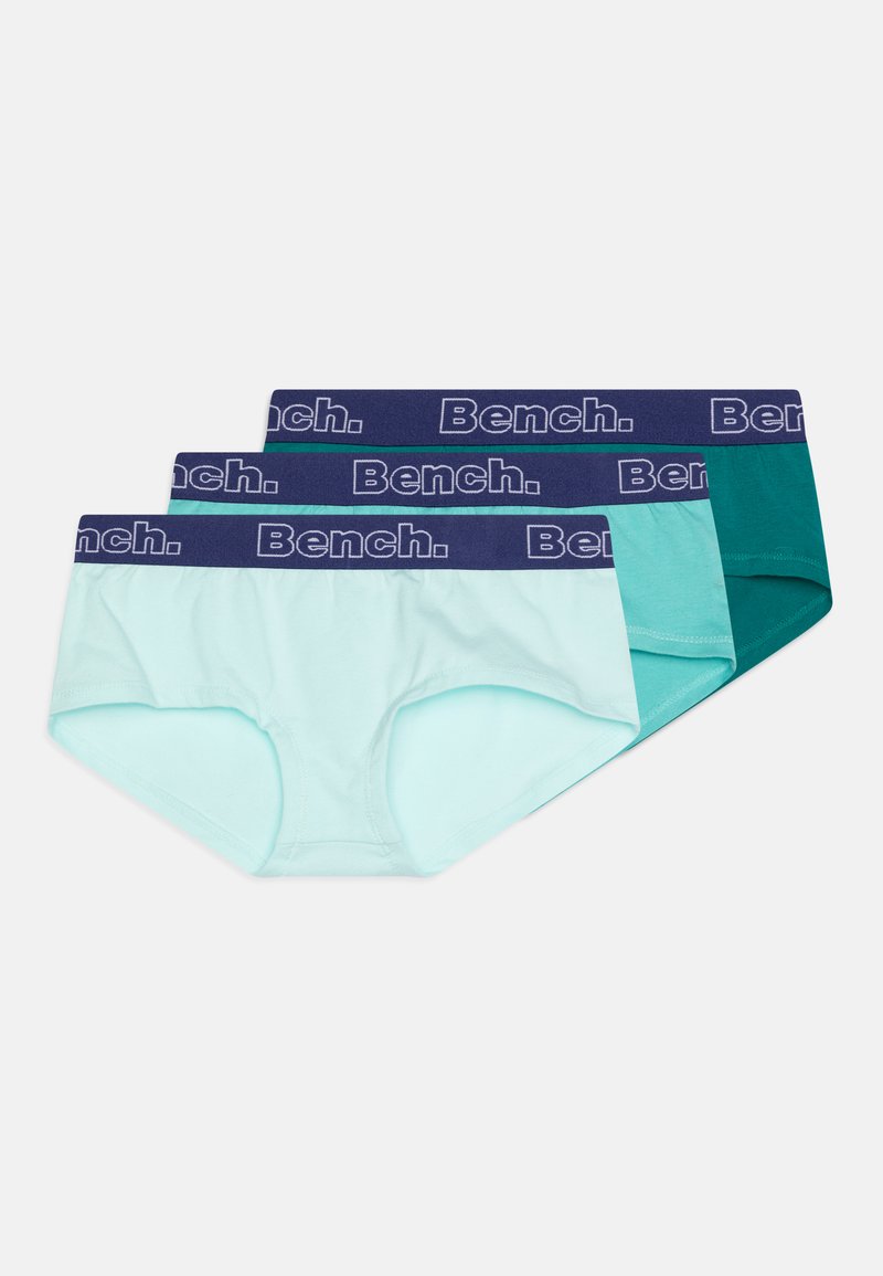 Trzy pary majtek damskich w jasnym miętowym, tealowym i ciemno-tealowym kolorze, z elastycznym granatowym paskiem w talii z logo "Bench." Gładki, elastyczny materiał.