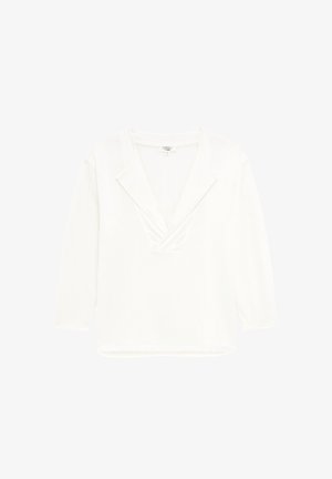 Valkoinen kevyt pitkähiha toppi, jossa on syvä V-kaula-aukko ja päällekkäinen kaulusmuotoilu. Sujuva rakenne, suora helma.