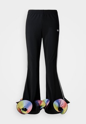 Zwarte sportbroek met een brede, uitlopende snit. Voorzien van kleurrijke, gerimpelde onderranden en witte zijstrepen. Gemaakt van rekbaar materiaal.