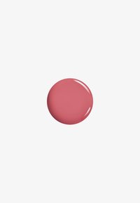 Campione cremoso e rotondo di vernice rosa chiaro con un finish lucido, su uno sfondo bianco semplice.